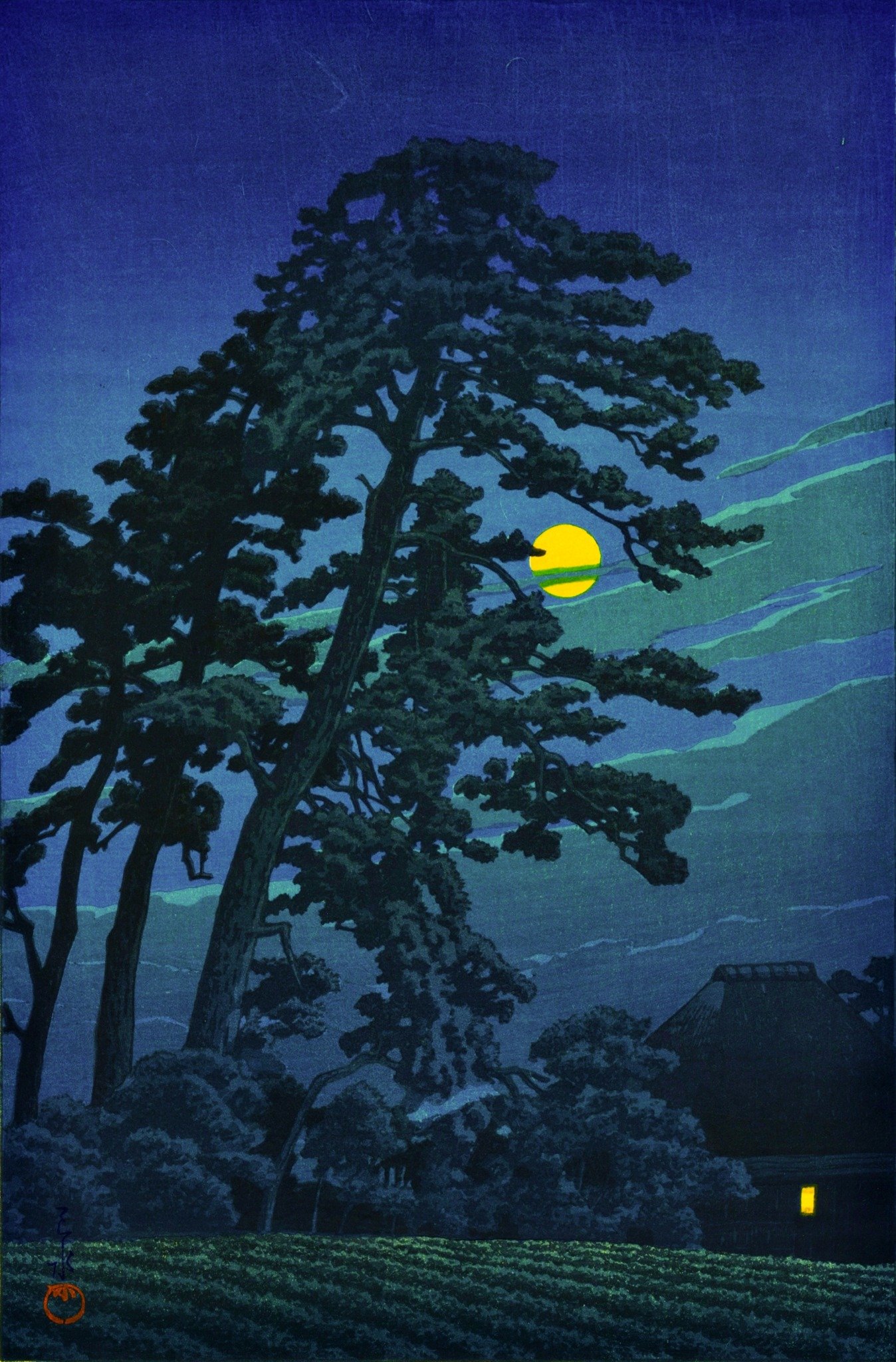 Full Moon at Magome by Kawase Hasui: dark pines frame a yellow moon crossed by clouds, above a farmhouse with one lit window and a green field.