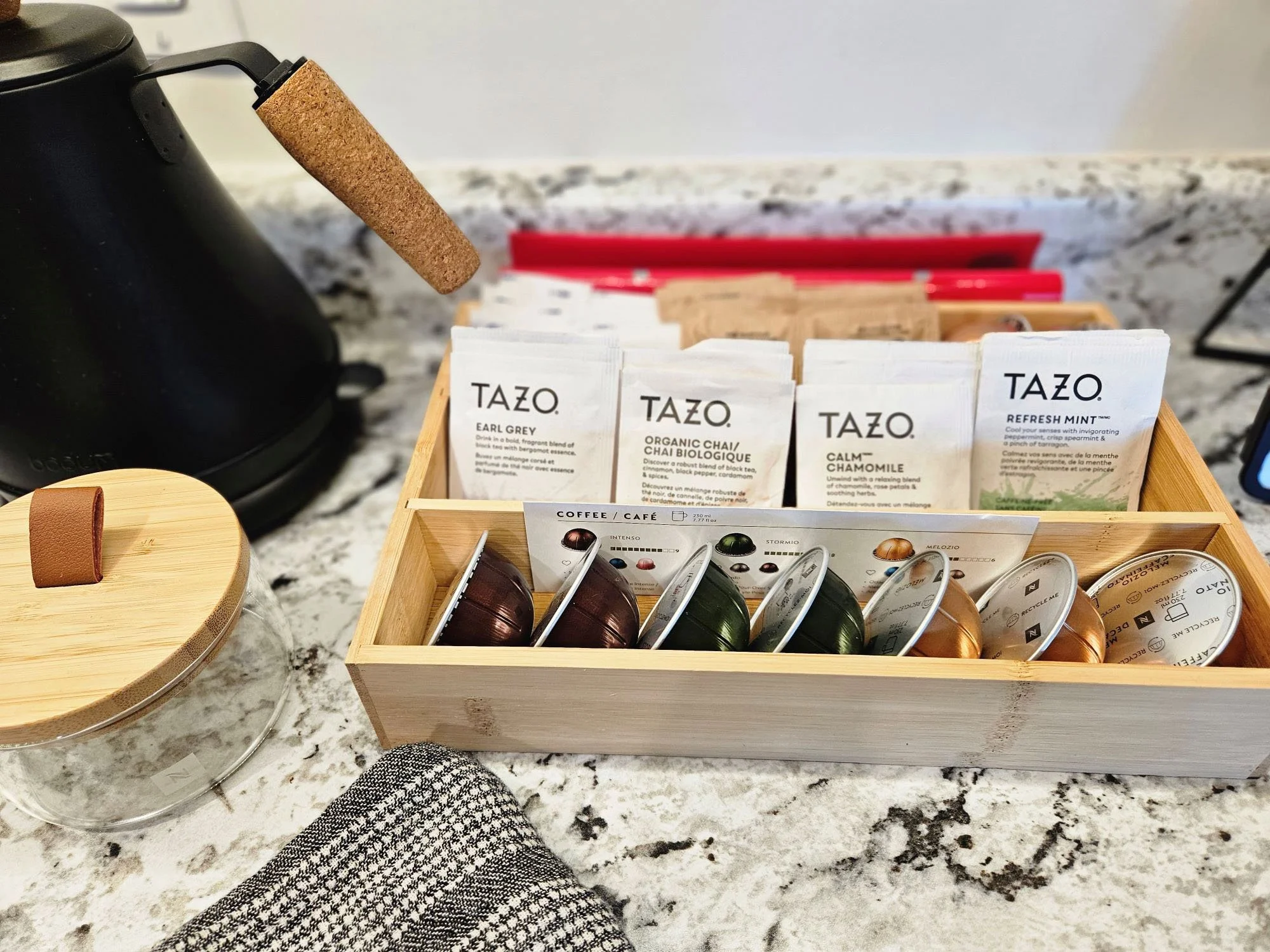 Nespresso pods and tea display kitchen counter