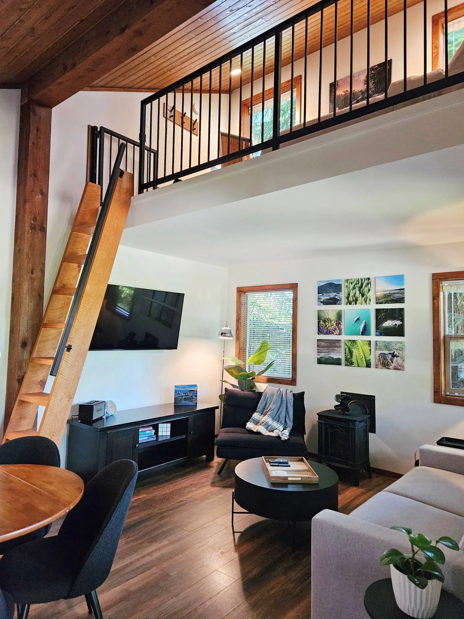 Living room with loft bedroom cabin