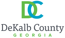 DeKalb County Georgia logo with green, blue, and black text
