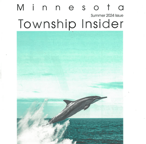 Cover of Minnesota Township Insider magazine featuring a dolphin jumping out of the water.