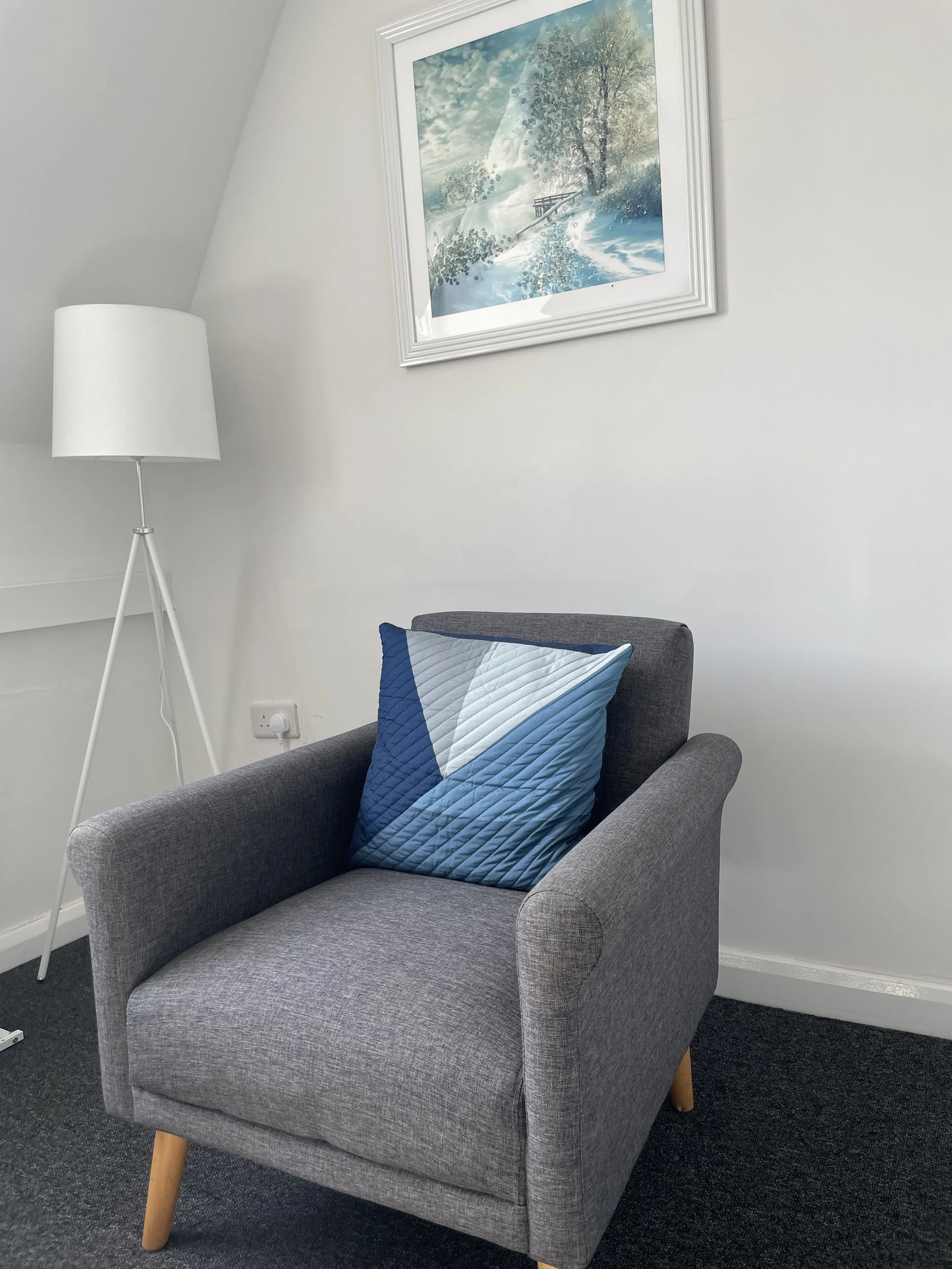 Therapist's chair in the consulting room at Nilima Choudhury Therapy, Clapham North, South London