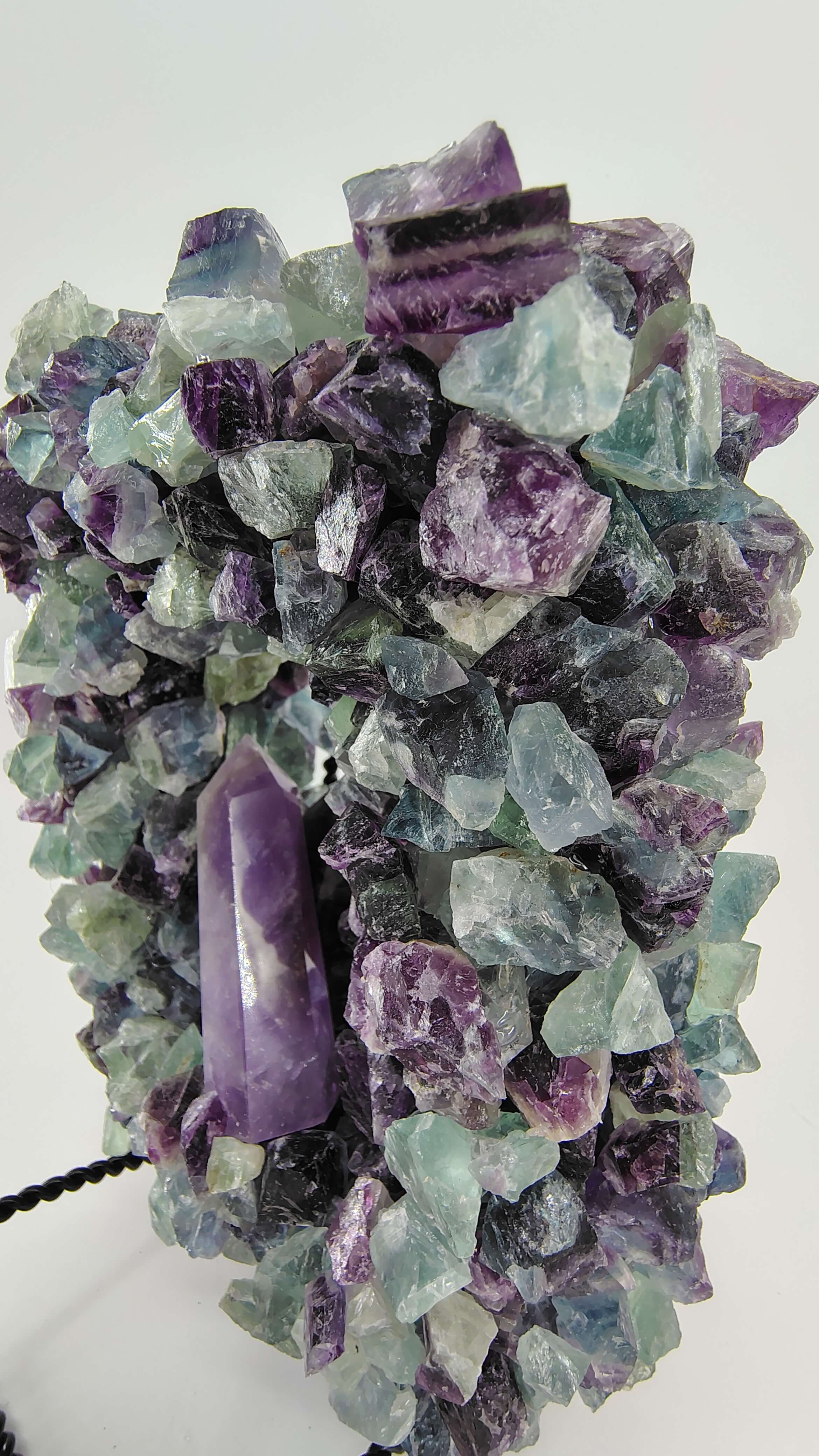 Amethyst framed in rainbow flourite 3 (1).jpg