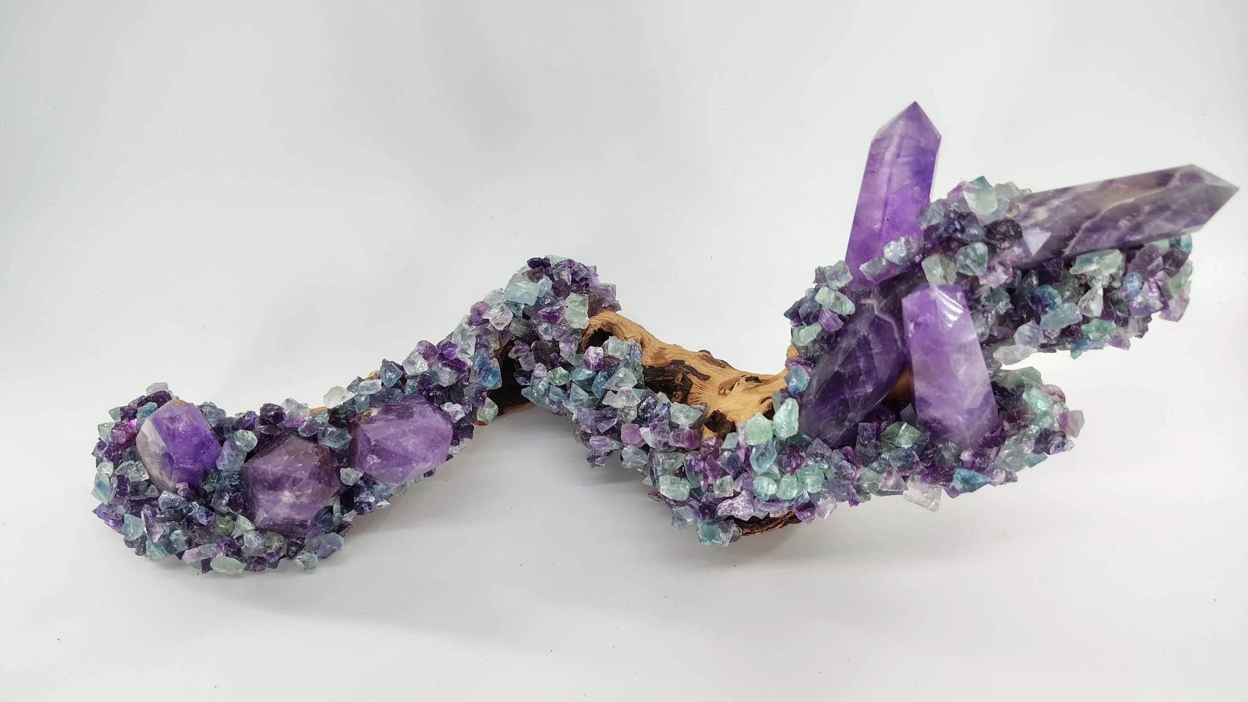 Amethyst,rainbow flourite on mopani 2.jpg