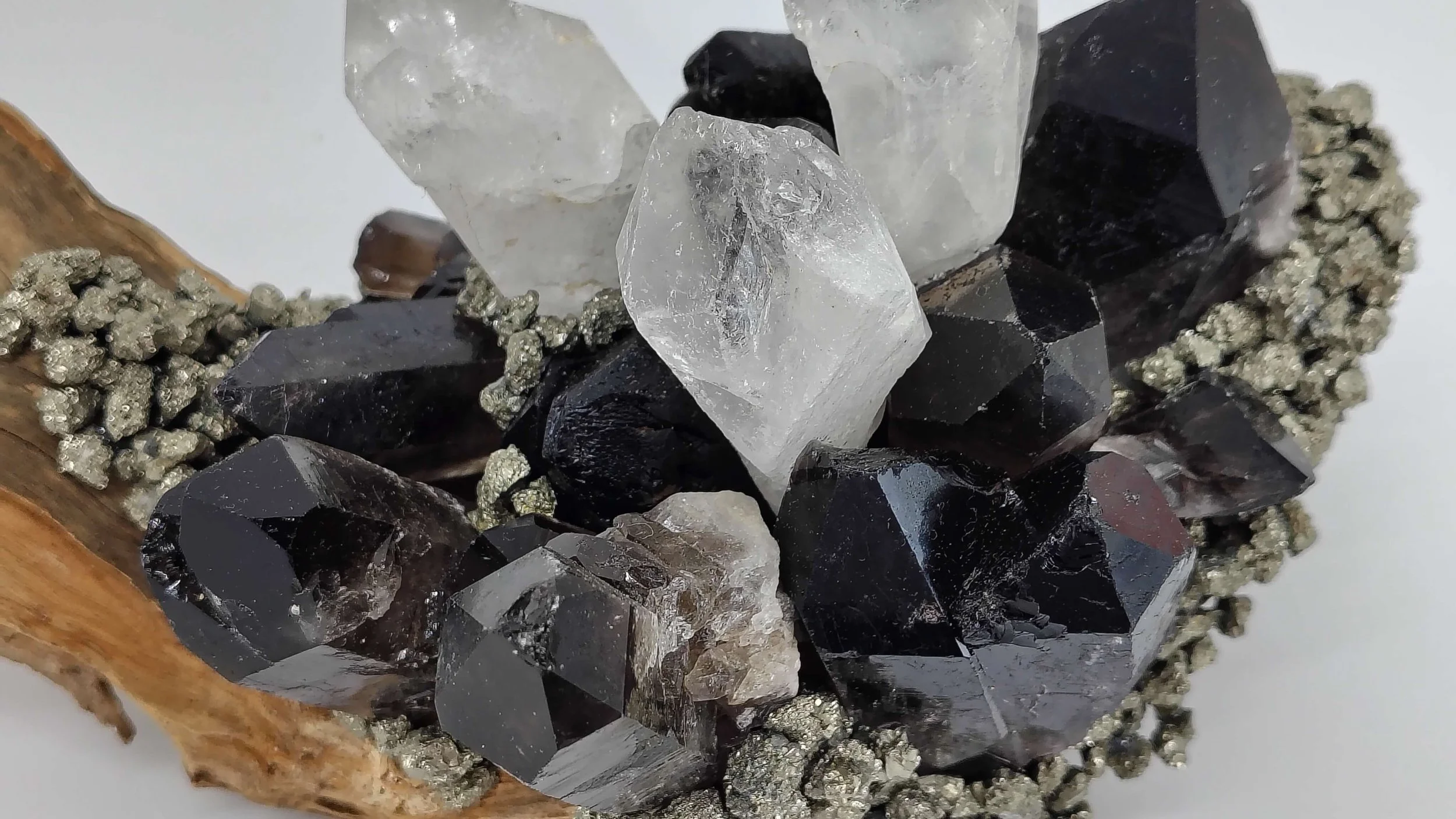 Clear quartz,smokey quartz,pyrite on hardwood 4.jpg