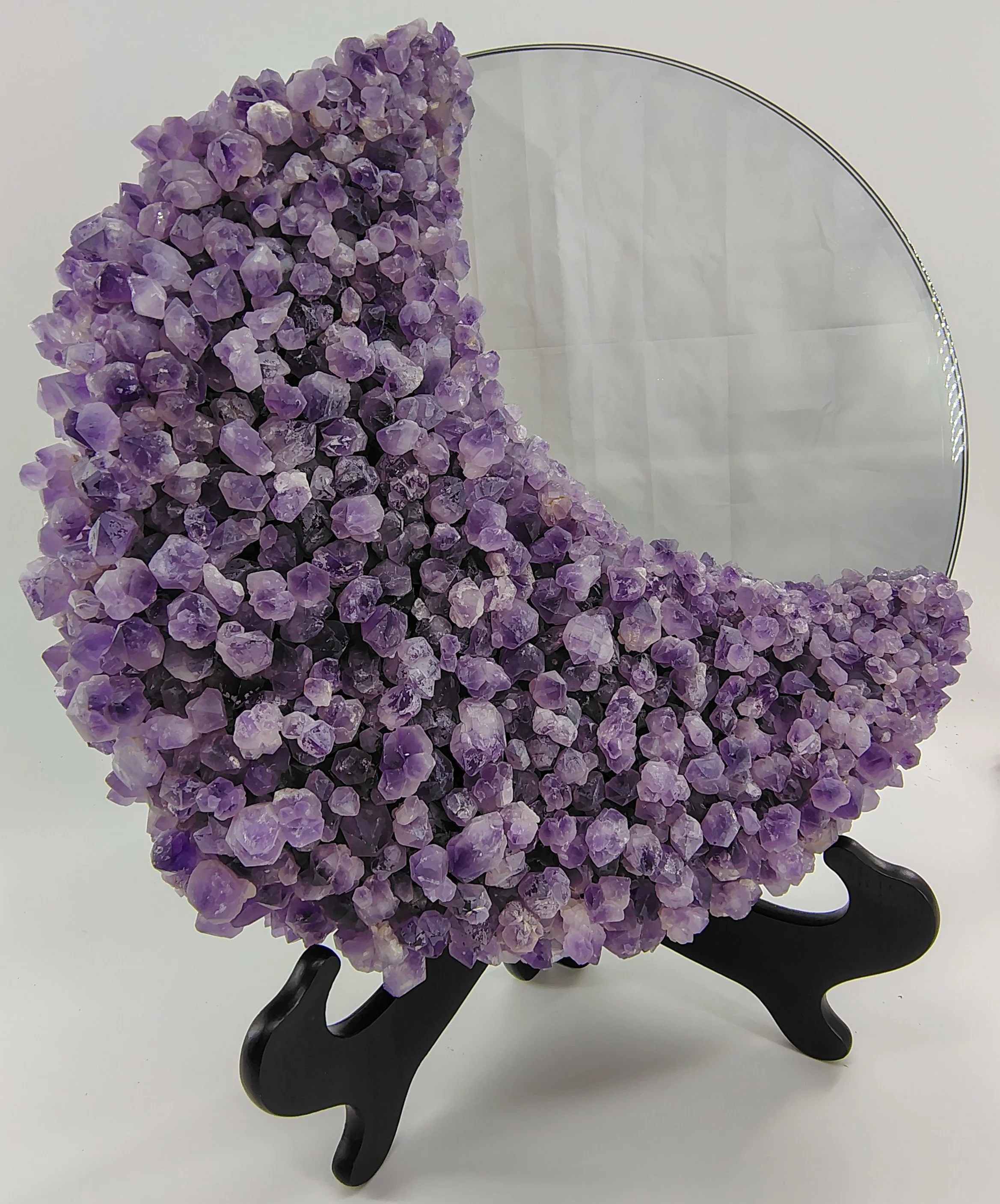 Skeletal amethyst moon mirror title.jpg