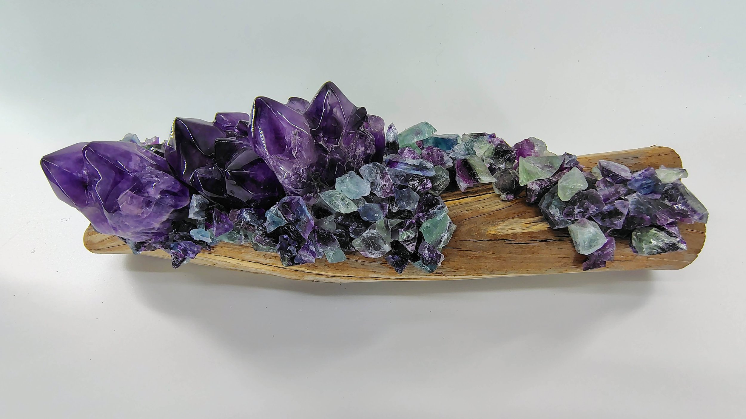 Amethyst,rainbow flourite on hardwood 2.jpg