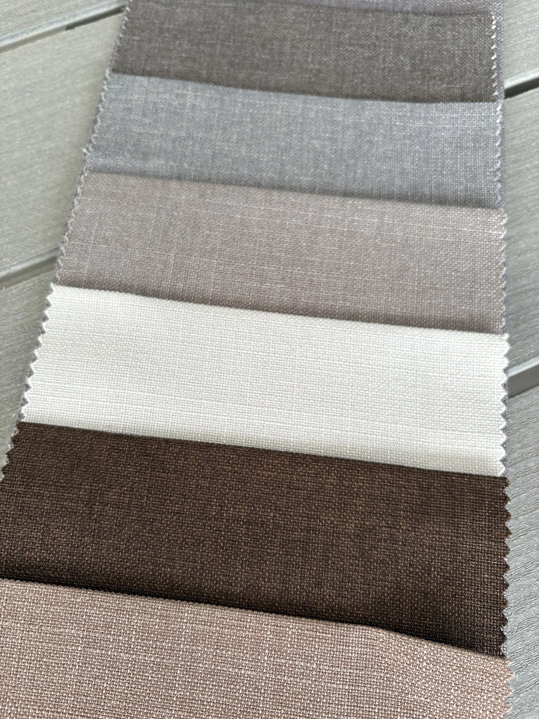 Premium linen fabric samples for custom window treatments and Roman shades.
