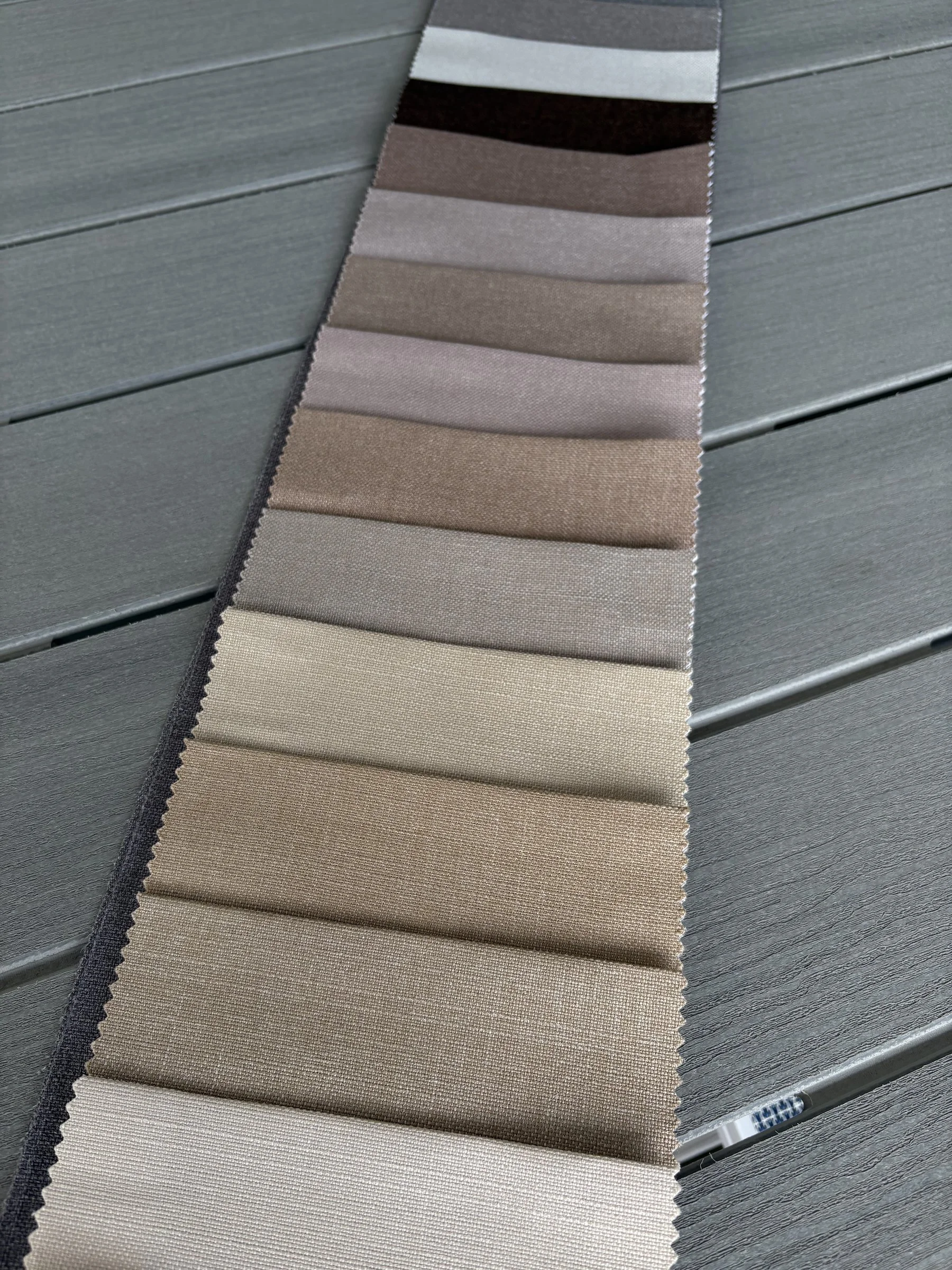 Neutral European fabric samples for custom Roman shades and curtains by Amber Haus.
