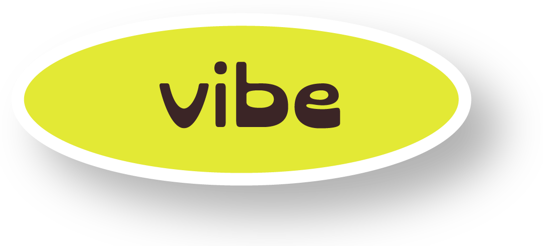 Yellow oval sign with the word 'vibe' in lowercase black letters