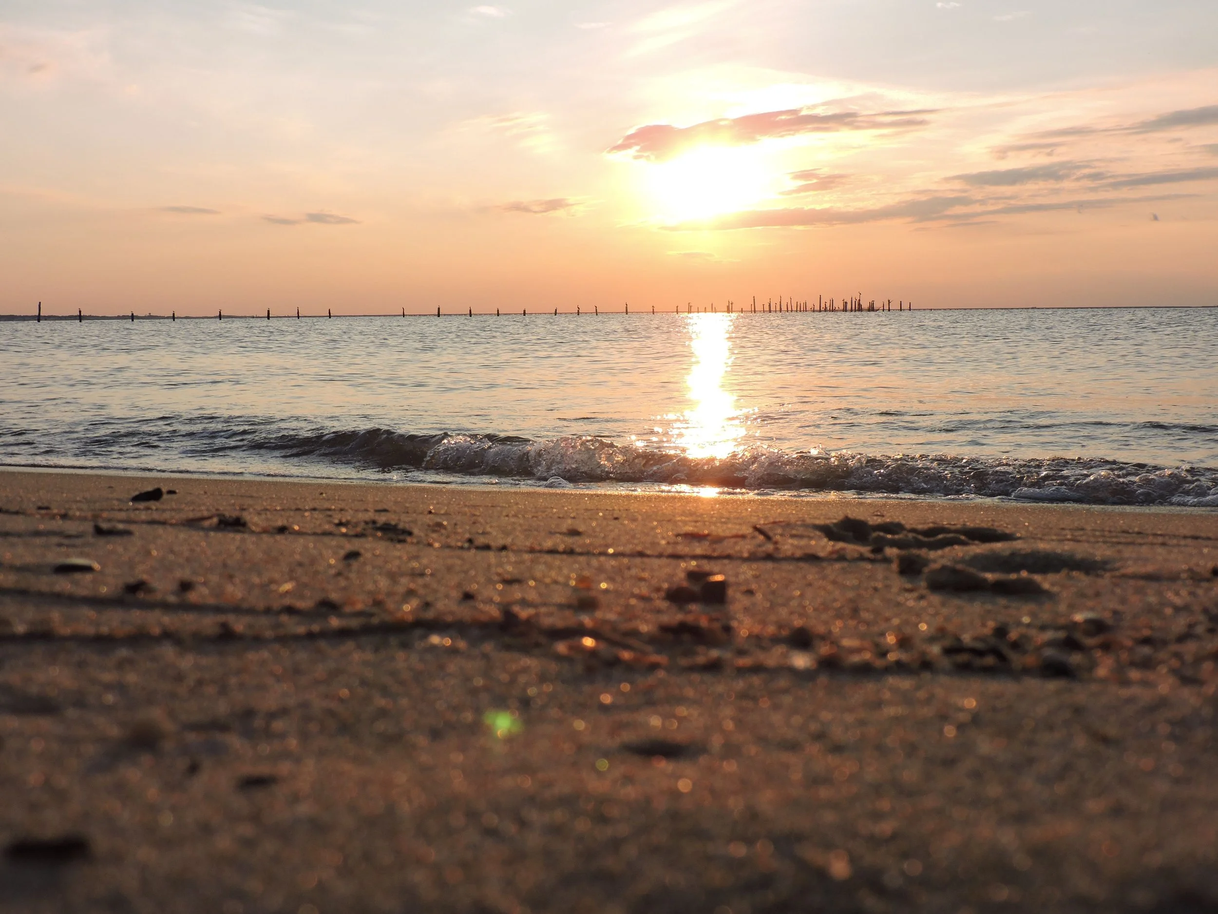 Image of a beach at sunrise.