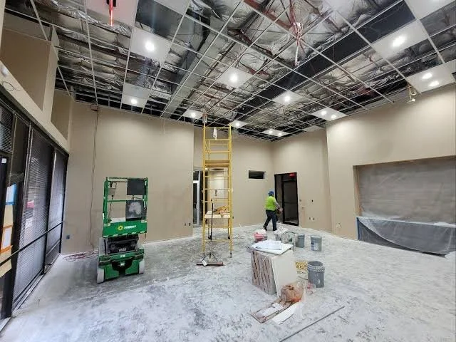 Foothill Corporate Center interior remodel, exposed ceiling grid mid-construction