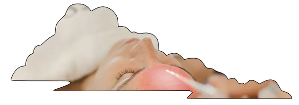Close-up of a person receiving a medical or cosmetic treatment around the nose and eye area.