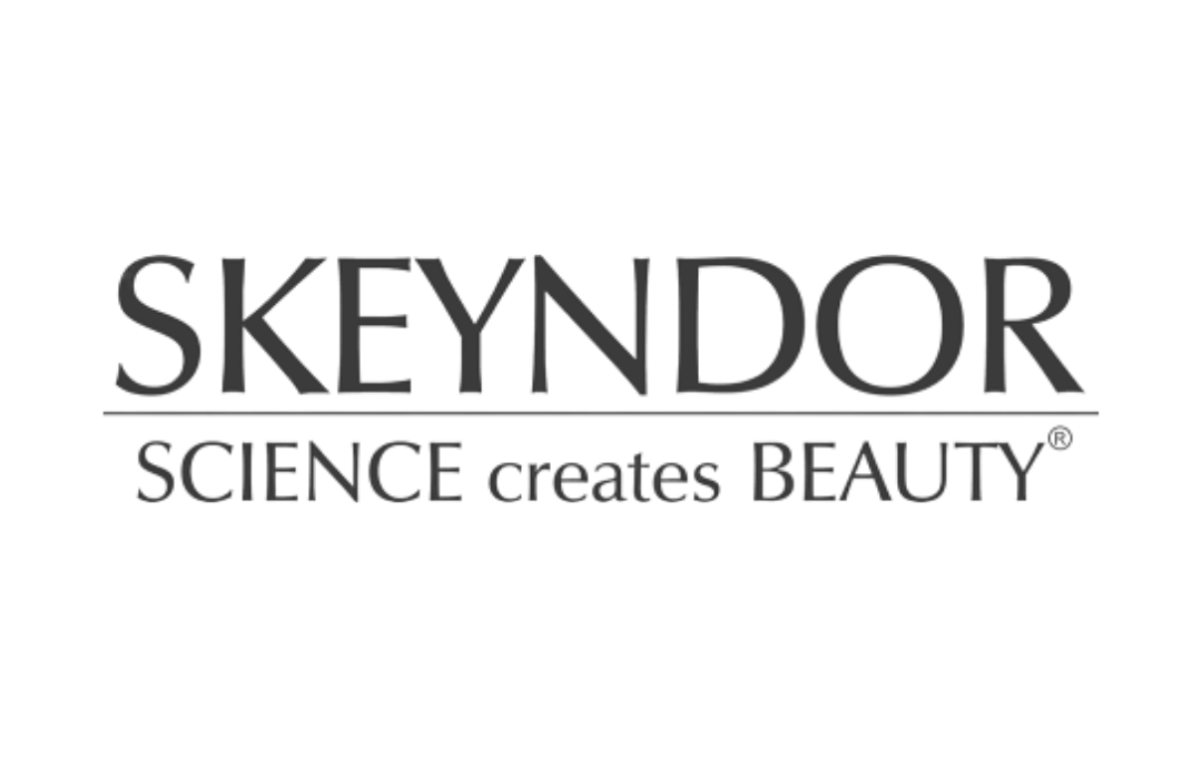 The logo of Skeyndor with the slogan 'Science creates Beauty' beneath it.