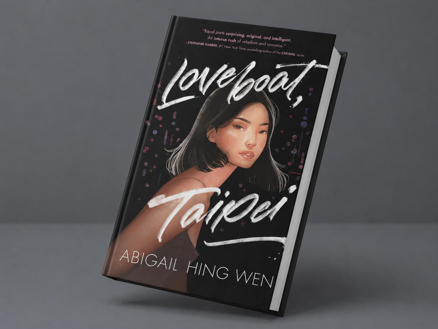 A black hardcover book titled "Loveboat, Taipei" by Abigail Hing Wen, featuring an illustrated portrait of a young woman with shoulder-length dark hair, set against a dark background with pink, purple, and white accents.