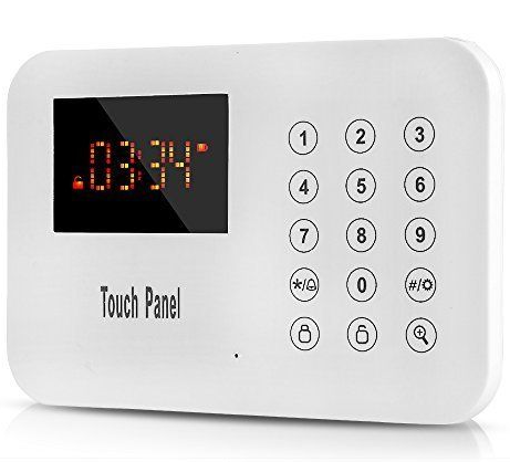 Digital alarm clock with keypad and touch panel display showing the time 03:34.