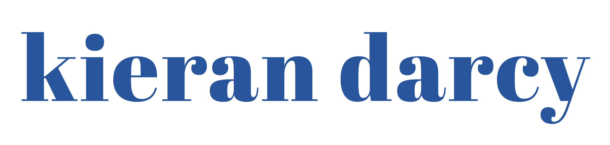 The image contains a large blue text that says 'kieran darcy' on a white background.