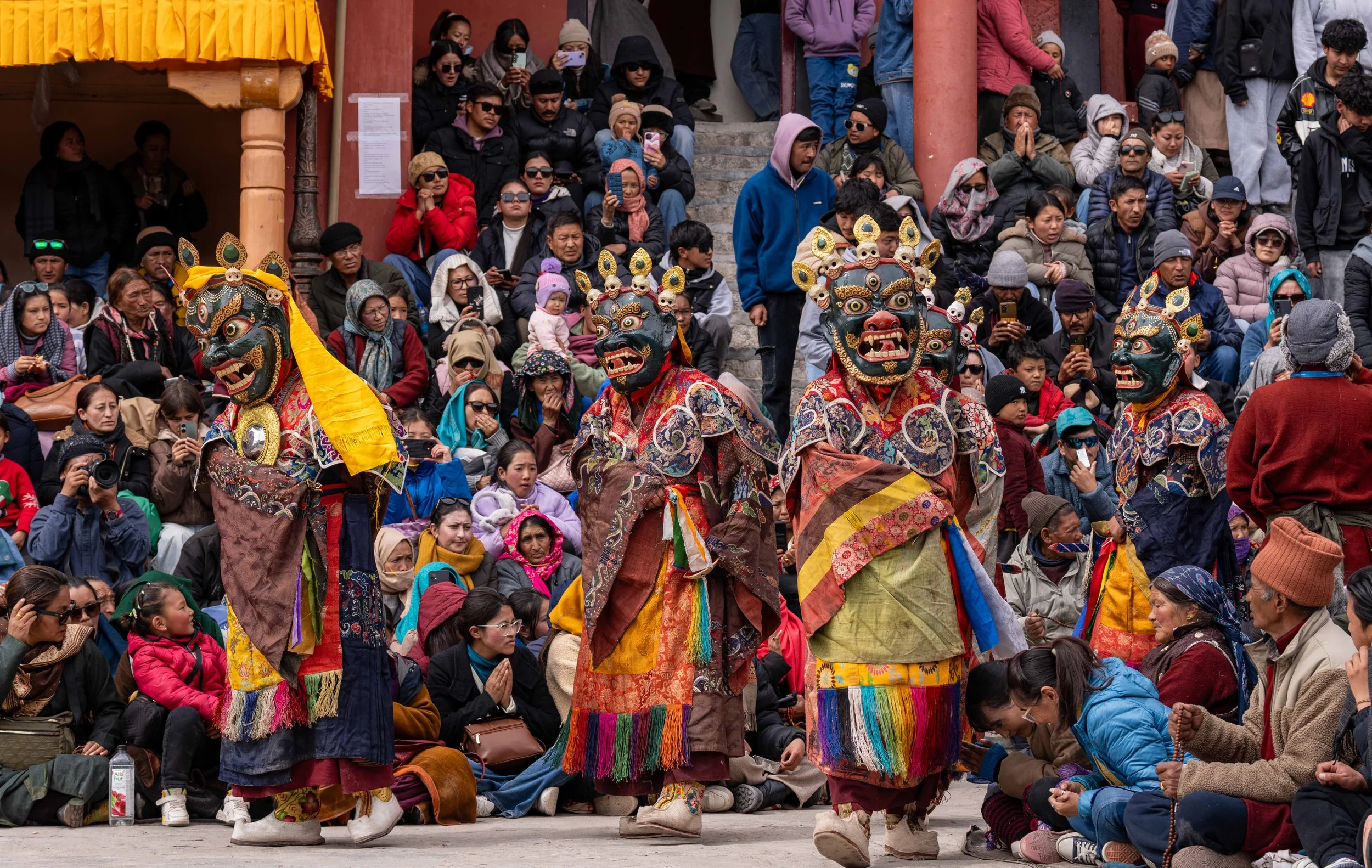 The entire community gathers at the Monastery for a festival in Leh India