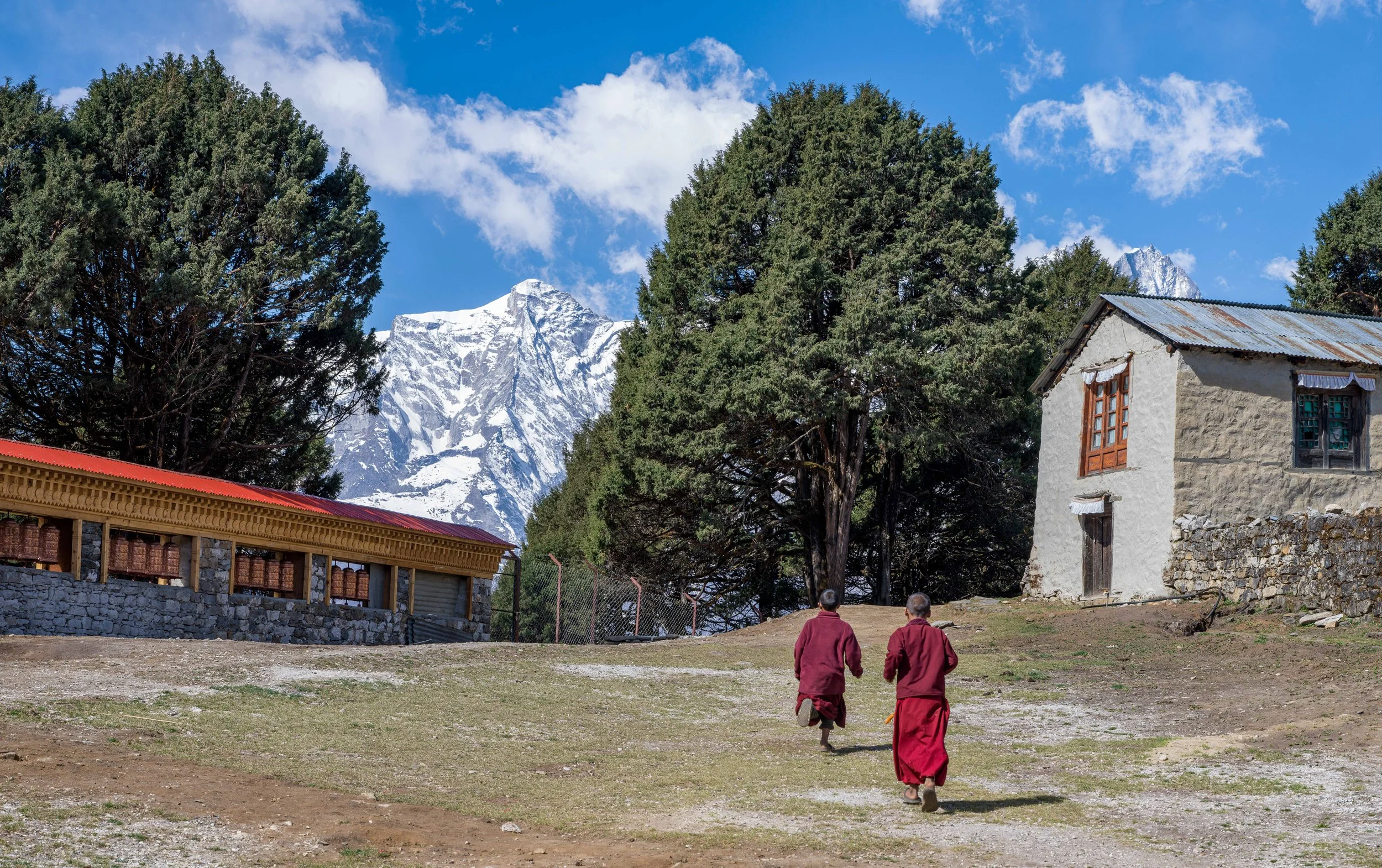 Two young monks at Tengboche Monastery, located at 12,687 feet in the Himalayas 
