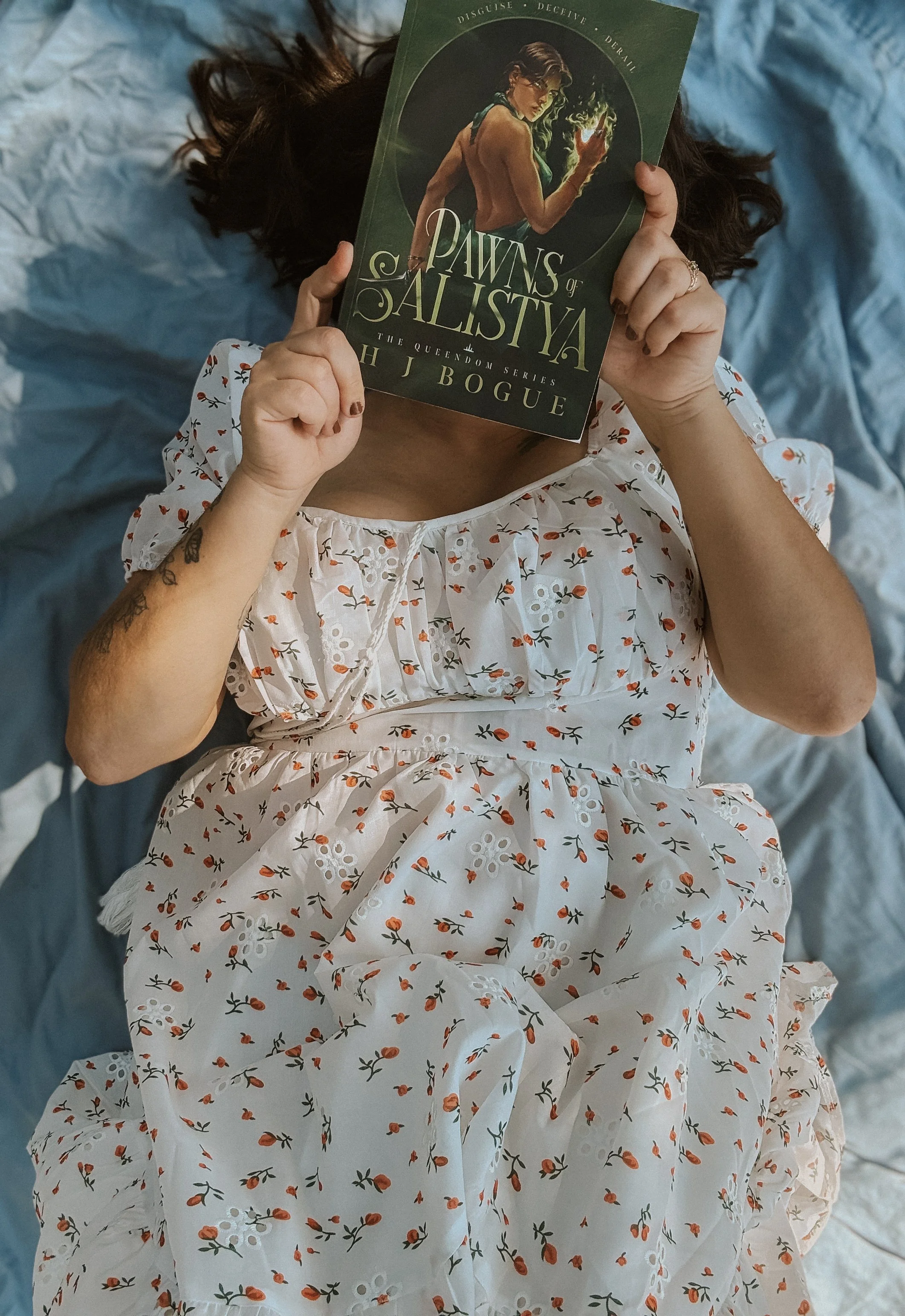 Laying with the book 1.jpg