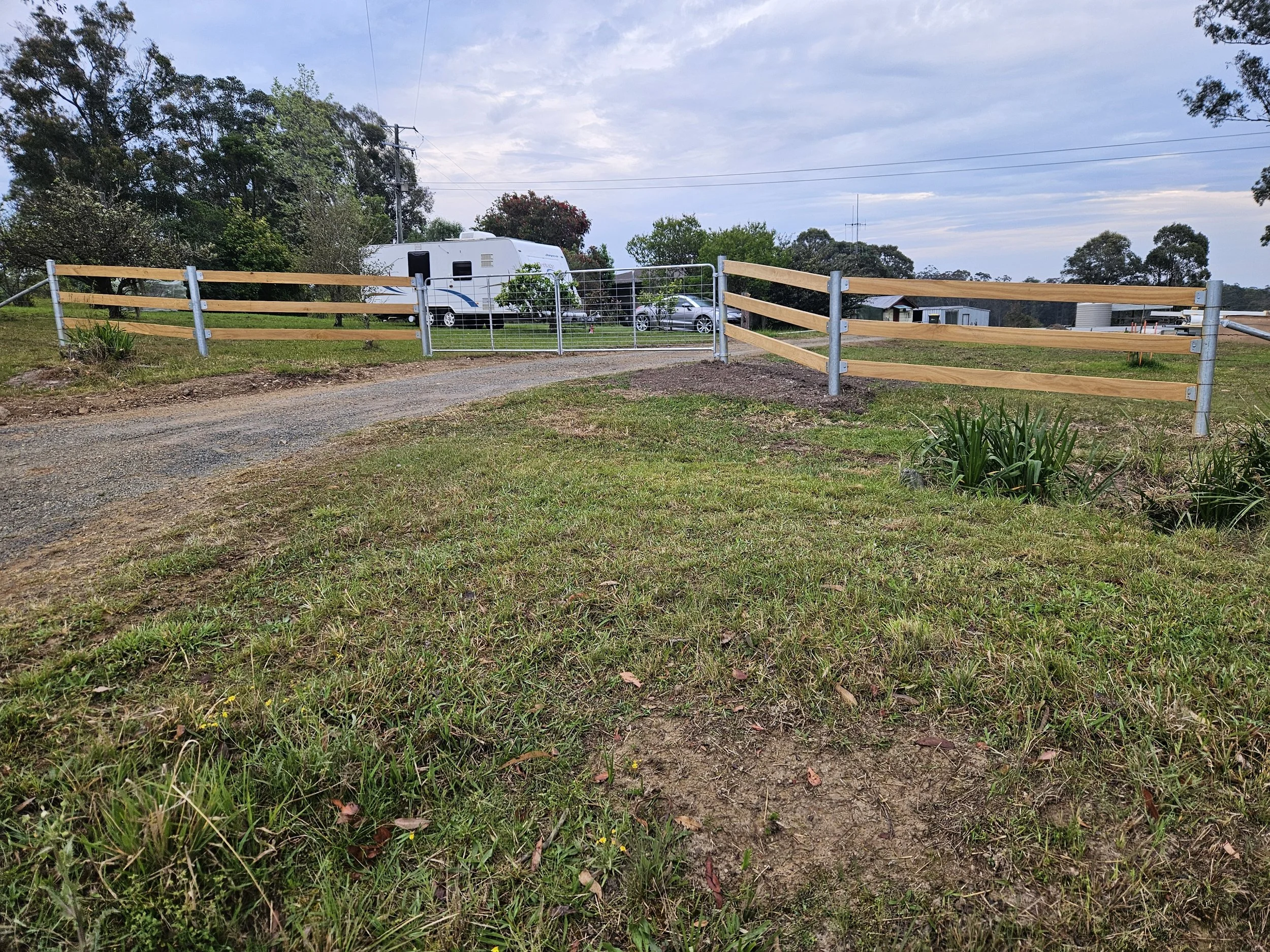 A post and rail driveway installation for a happy client in Hillview, NSW