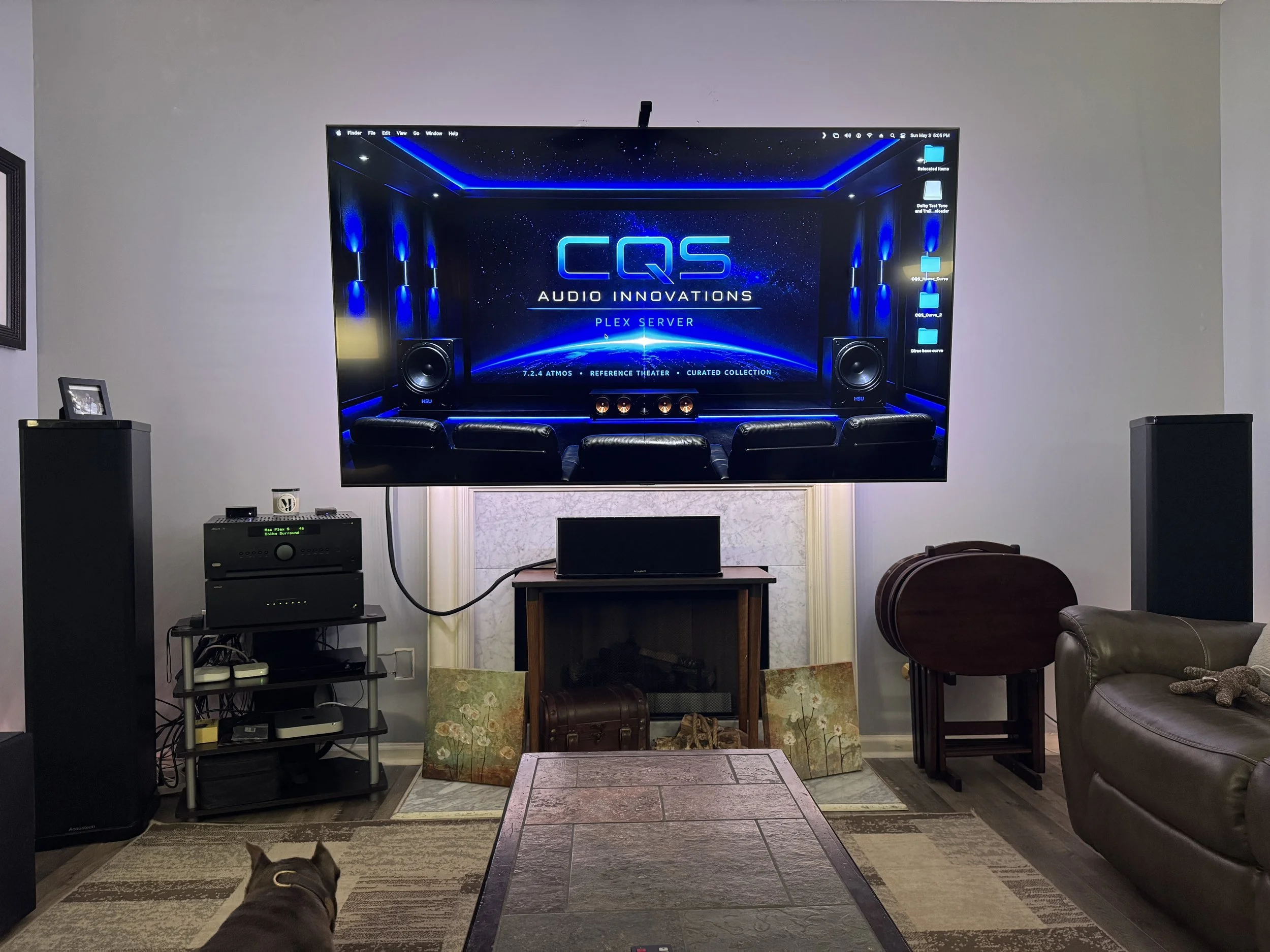 CQS Reference Theater with Dolby Atmos home theater system, media server display, front-stage speakers, and blue accent lighting.