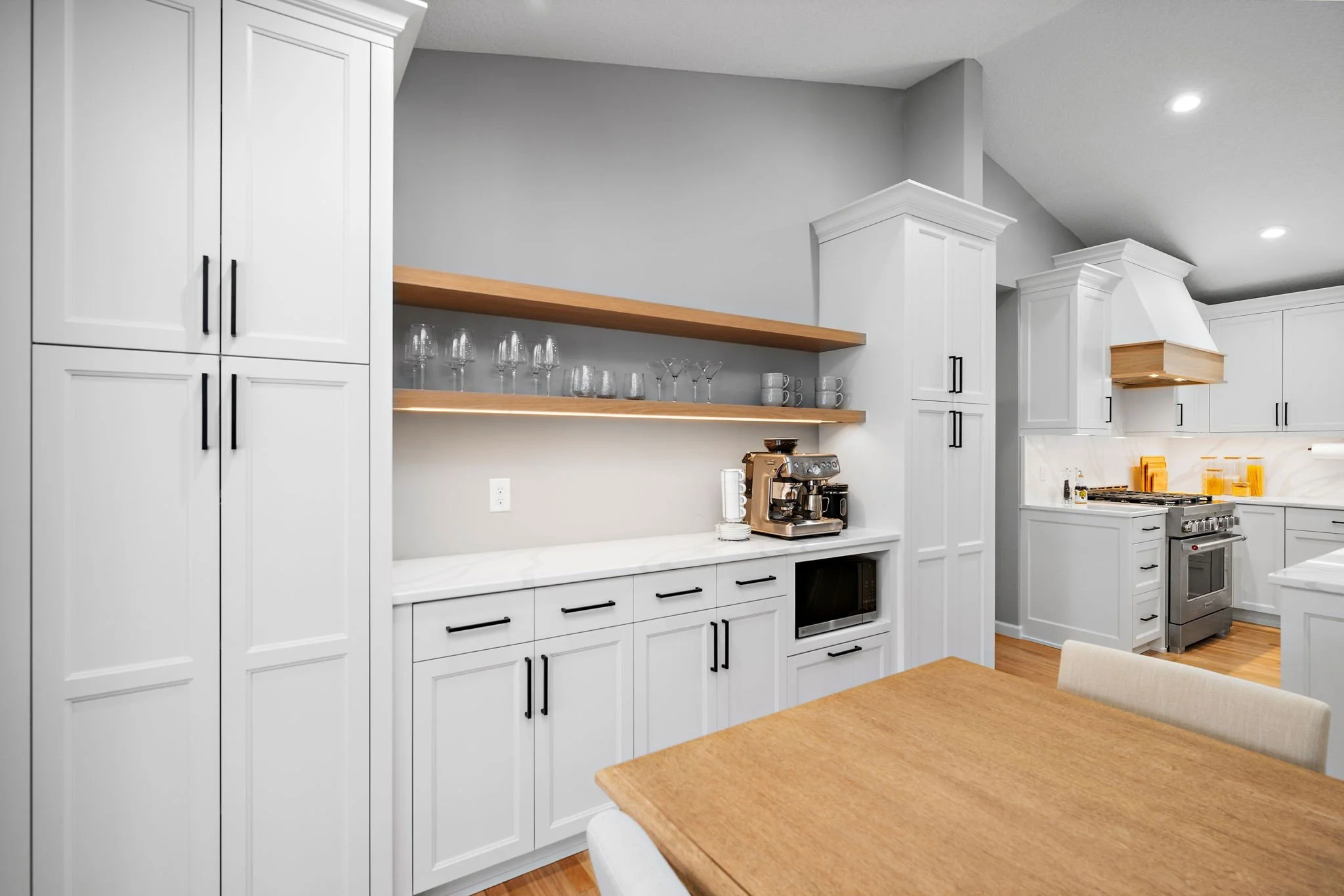 White oak floating shelves and butler's pantry
coffee bar, Minnetonka kitchen remodel