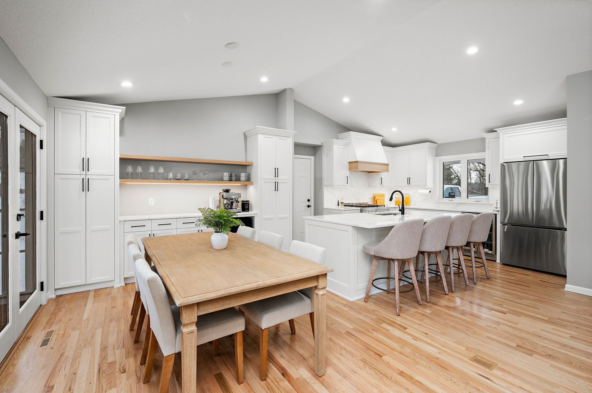 Open-concept kitchen and dining room with
vaulted ceiling, Minnetonka remodel