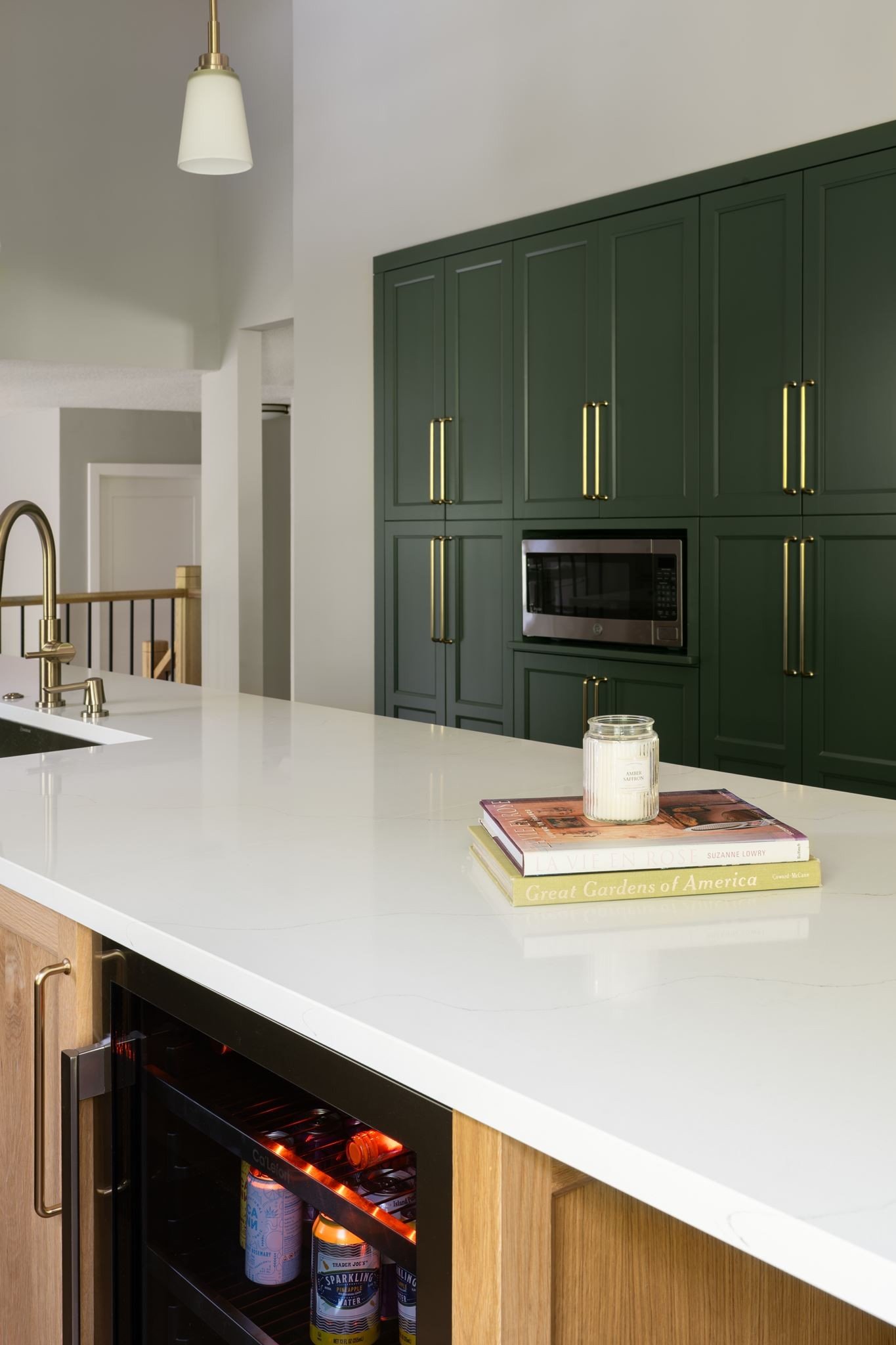 Vaulted ceiling above dark green kitchen
cabinetry, Eden Prairie remodel
