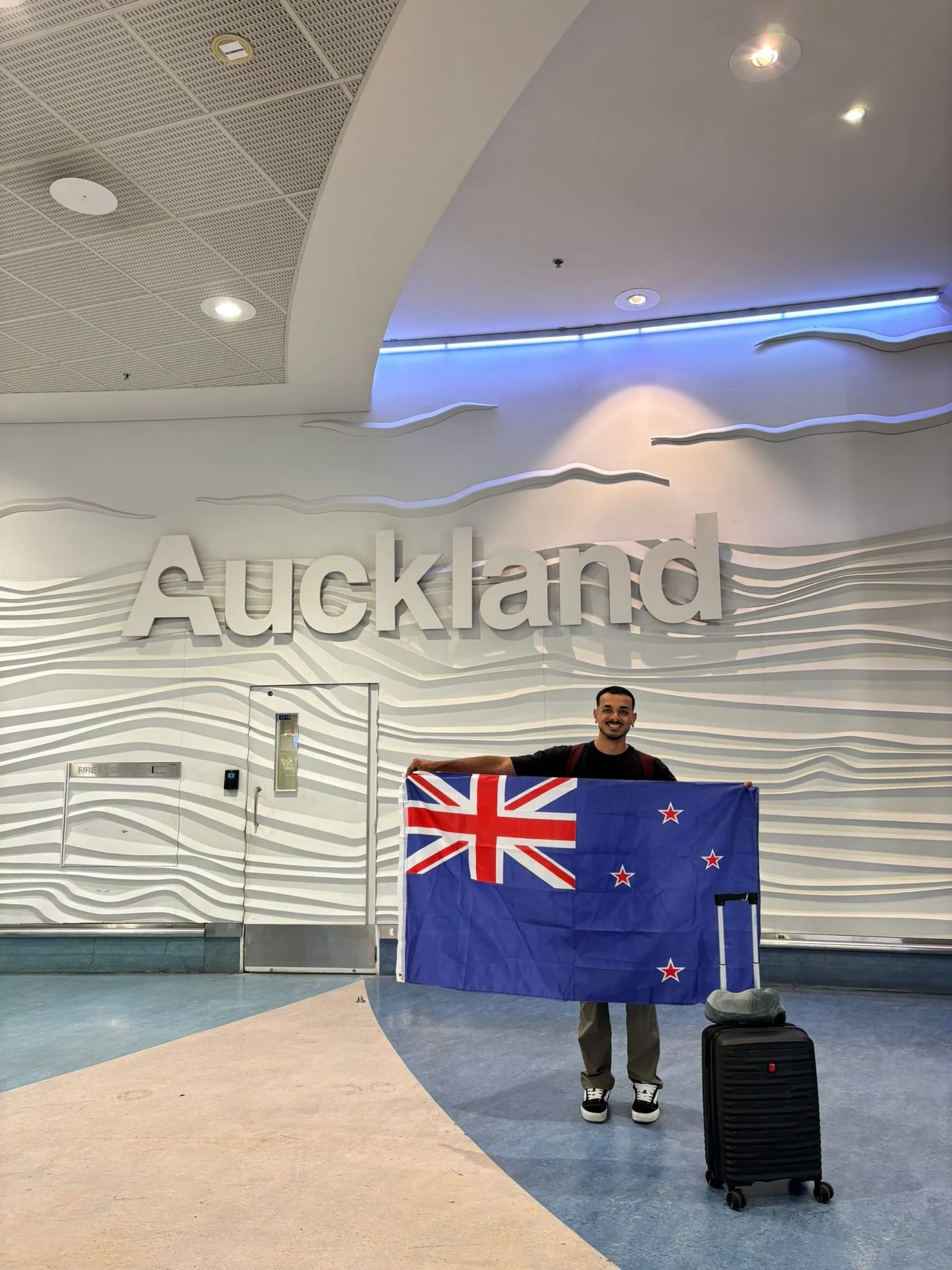 Viajero recibido por AnzaR Travel en la llegada del Aeropuerto de Auckland Nueva Zelanda
