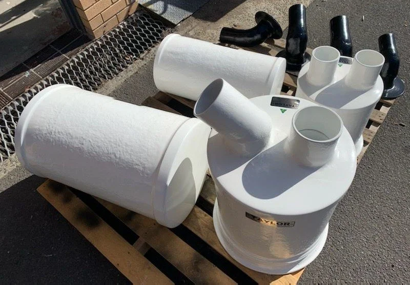 Custom manufactured in vinyl ester composite for a marine wet exhaust application.