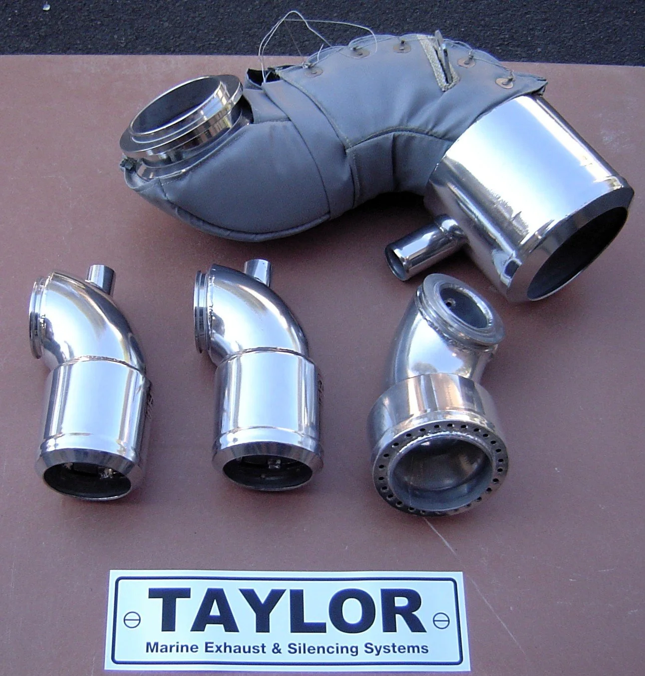 Precision fabricated stainless steel exhaust adaptors and fittings for marine applications.