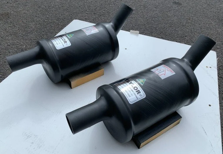 Marine exhaust silencers constructed from premium fire-retardant vinyl ester composite.