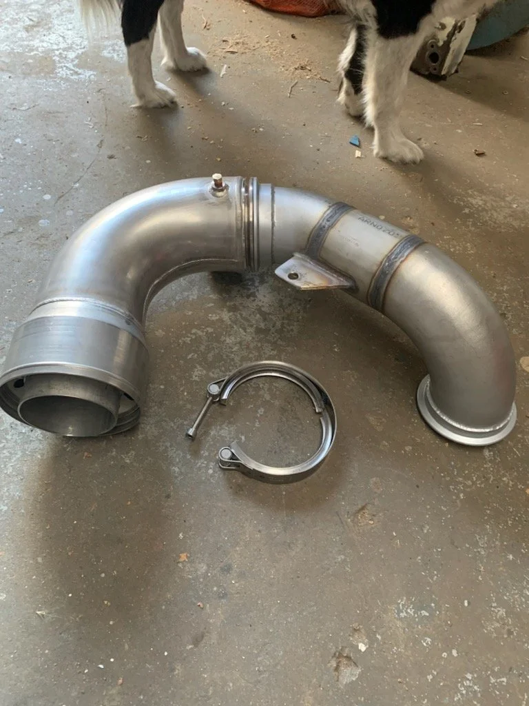 Marine-grade stainless steel exhaust elbow assembly manufactured for wet exhaust systems.