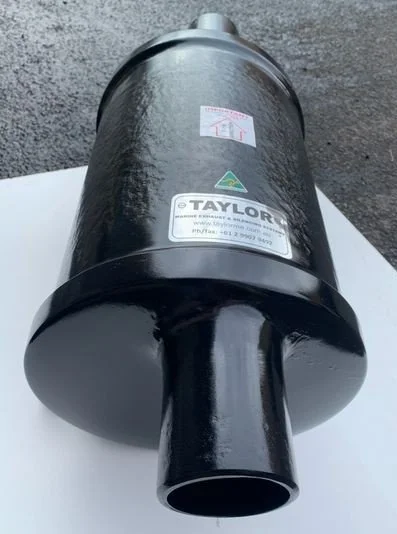 Marine inline silencer engineered for low back pressure and effective noise attenuation.