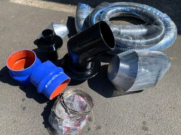 Marine exhaust accessories including bends, tubing and silicone hose connections.