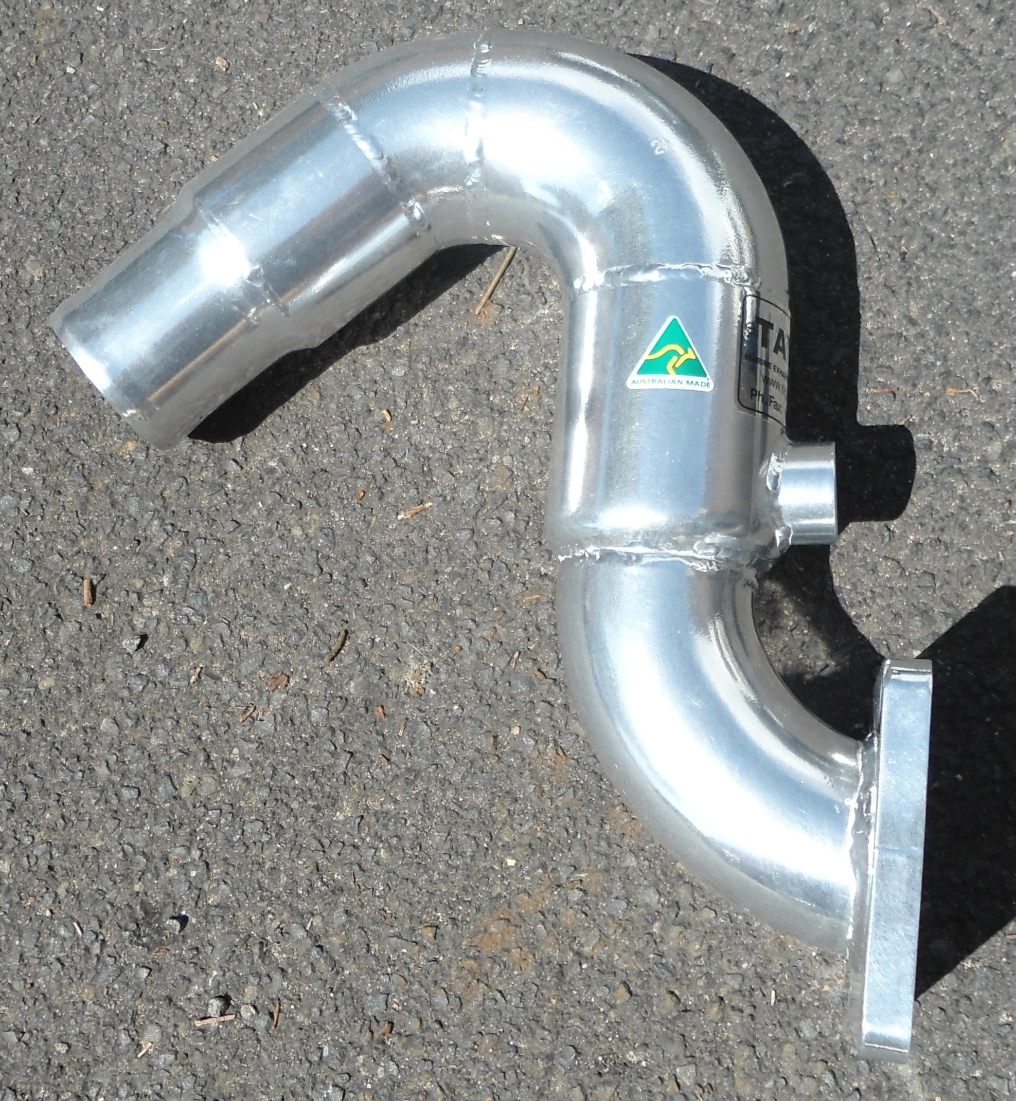 Custom stainless steel exhaust bends engineered for vessel-specific requirements.