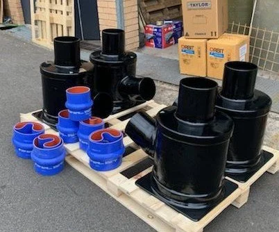 Custom exhaust package incorporating water gas separators, silencers and associated wet exhaust components.