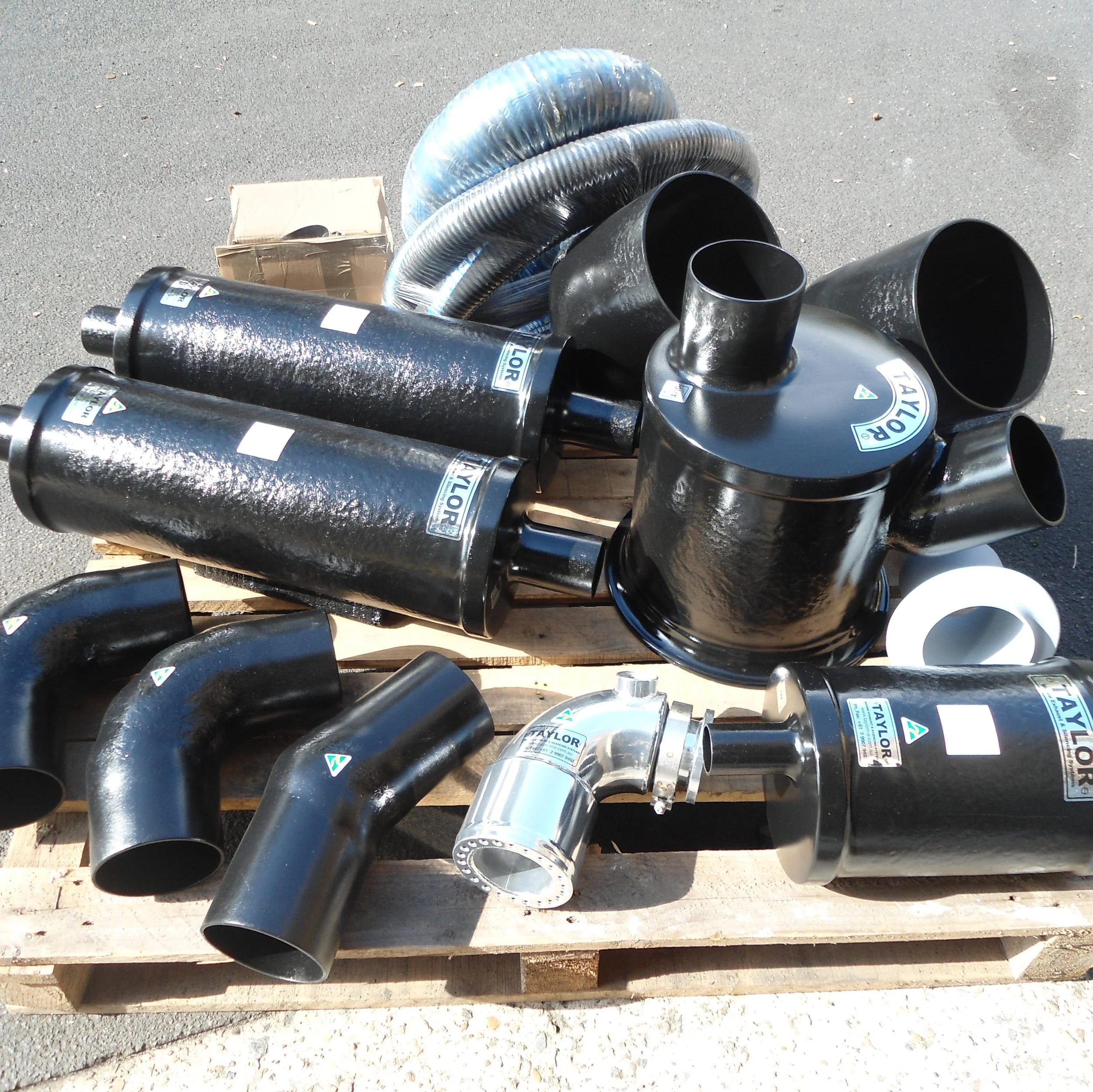 Marine exhaust components including silencers, bends, stainless steel components and fittings manufactured by Taylor Marine Exhaust.
