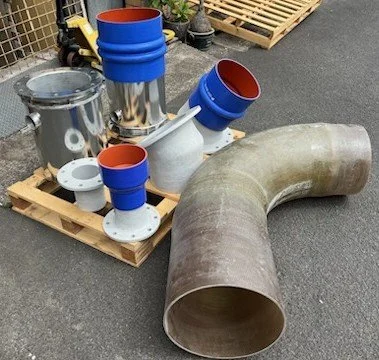 Custom wet exhaust accessories including tubing, hose and exhaust fittings.