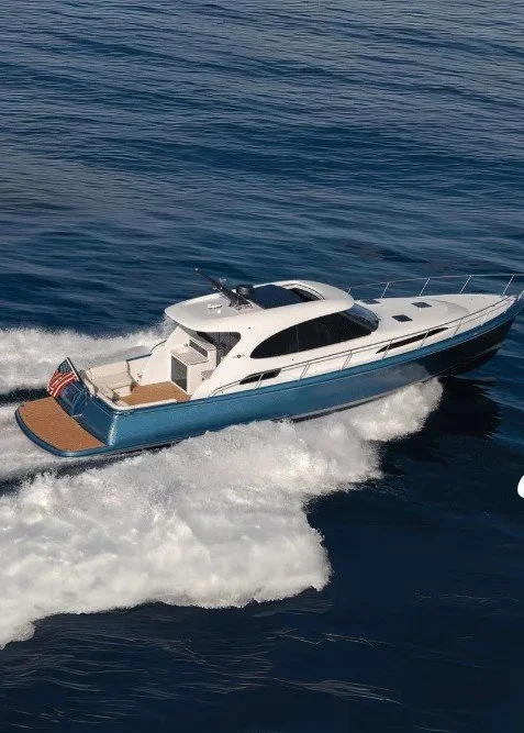 Custom marine exhaust system installed on recreational motor yacht.