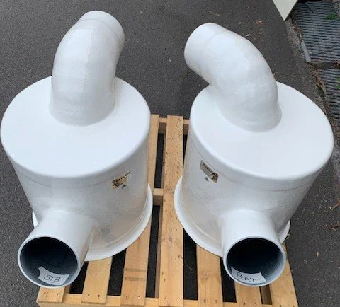 Marine exhaust silencing solution featuring a custom waterlock muffler configuration.