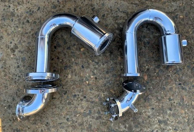 Stainless steel gooseneck exhaust components manufactured for marine wet exhaust systems.