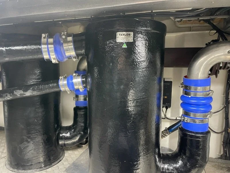 Installed vinyl ester Taylor Marine Exhaust system providing reliable wet exhaust performance in a commercial marine application.