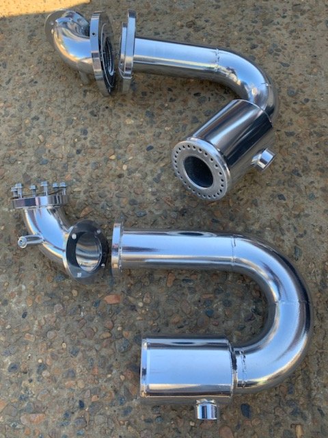 Custom stainless steel marine exhaust goosenecks manufactured for wet exhaust systems.