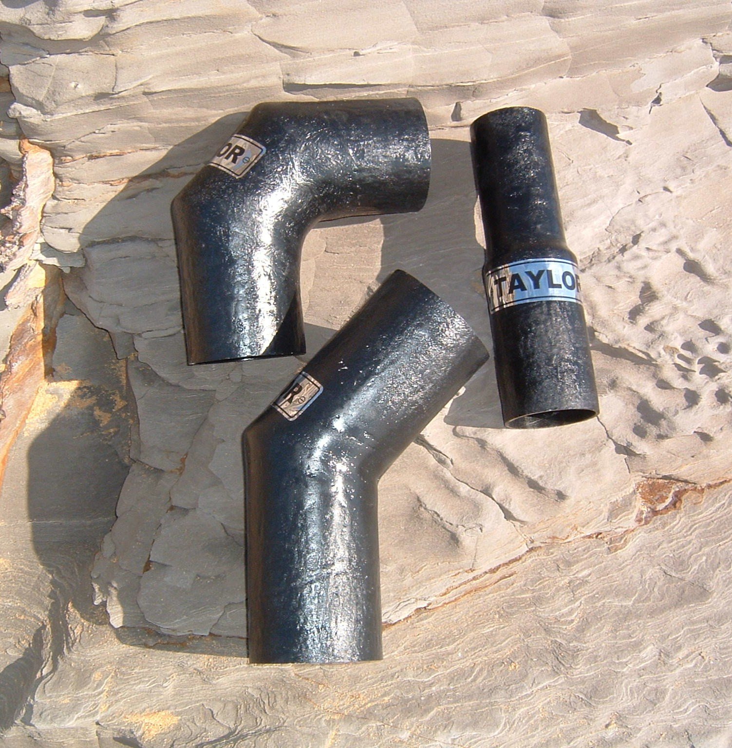 Glass-reinforced vinyl ester exhaust bends manufactured in custom angles and configurations.