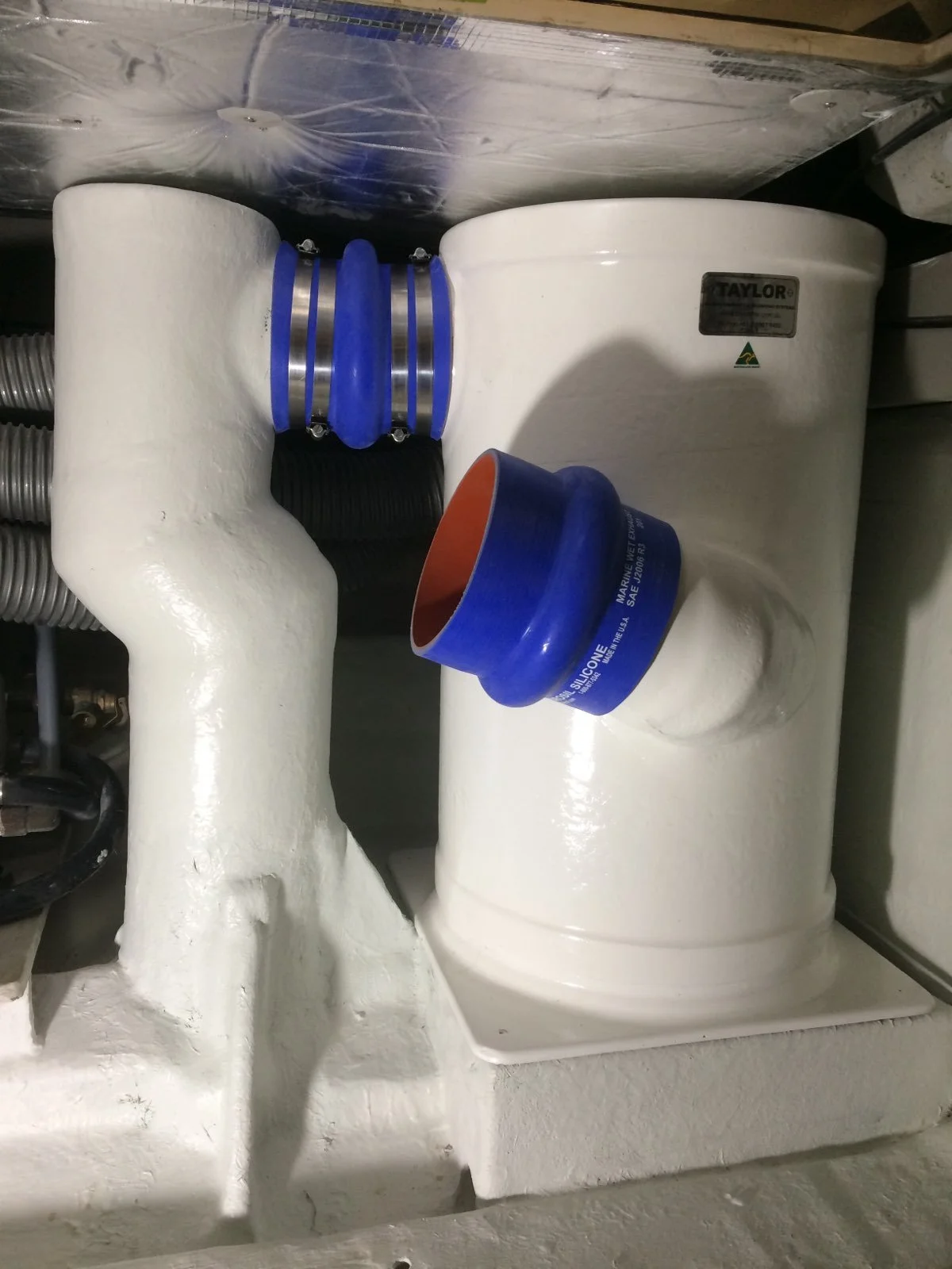 Vessel-specific installation incorporating marine-grade silicone hose connections.
