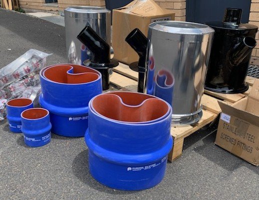 Marine exhaust accessories including silicone couplings and wet exhaust tubing.
