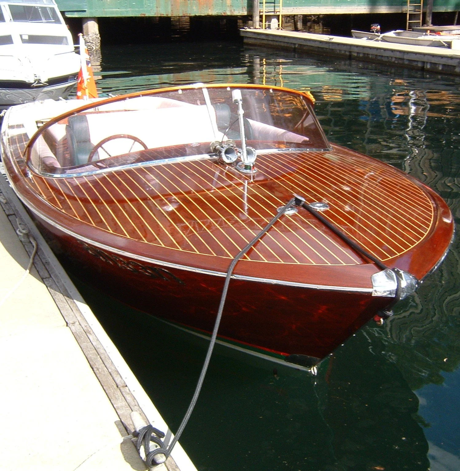 Taylor Marine Exhaust system supplied for a classic timber runabout built for recreational boating and luxury cruising.