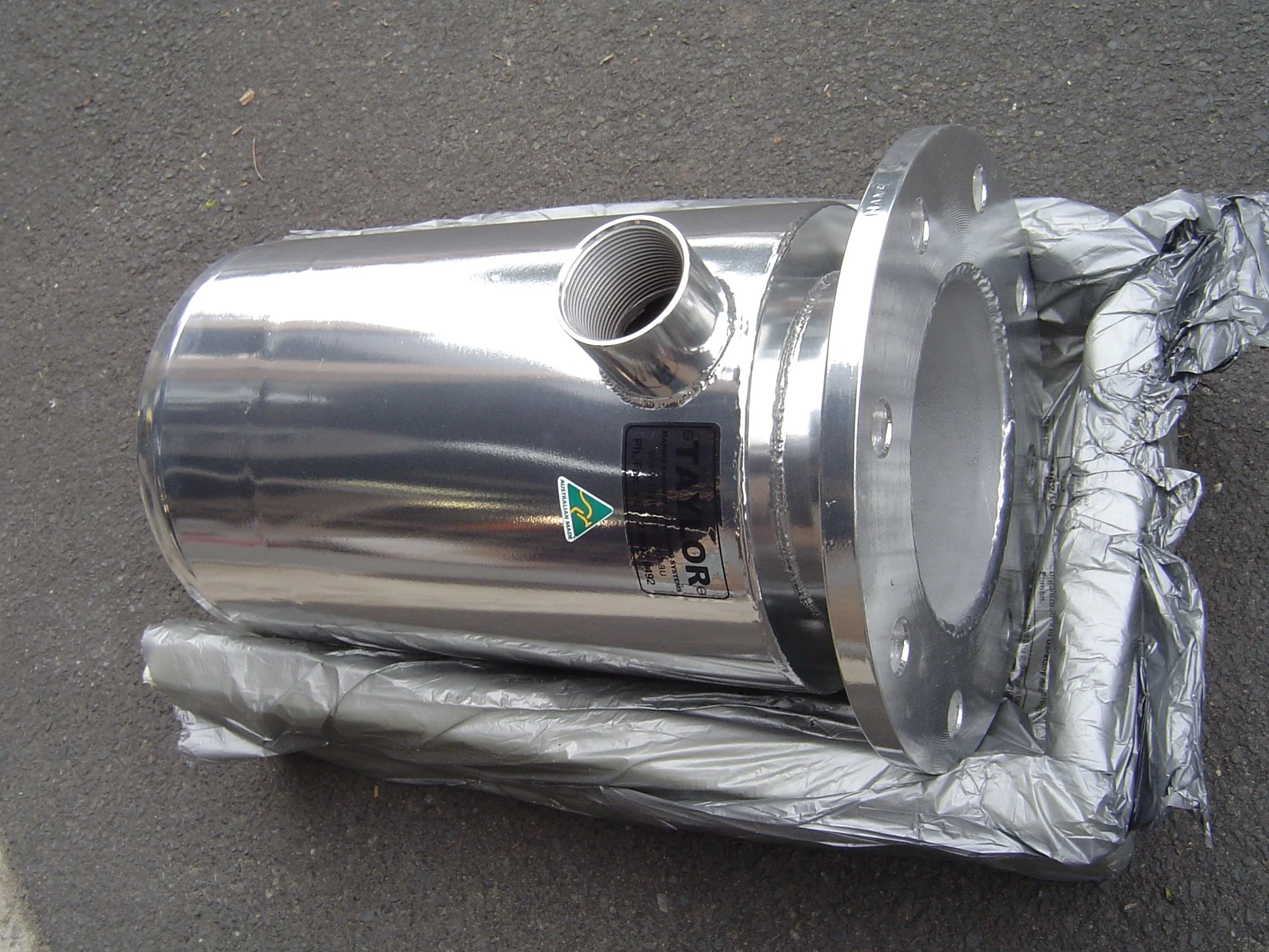 Marine-grade stainless steel exhaust mixer manufactured for custom vessel applications.